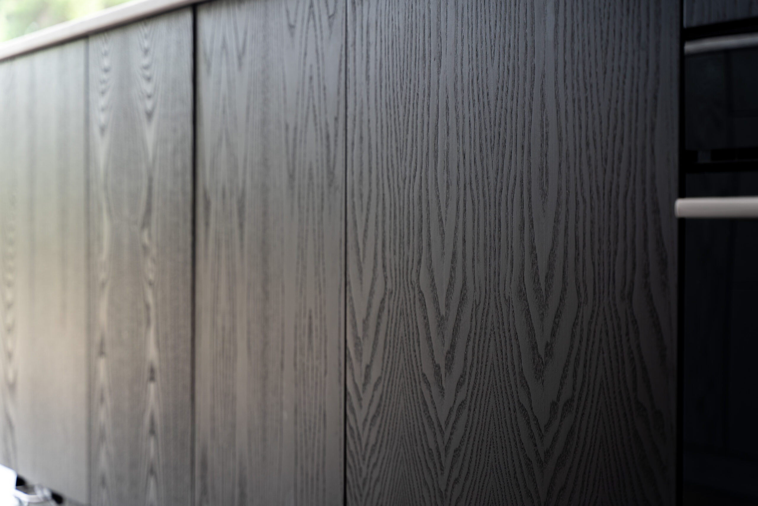 Dark-stained ash veneer Callerton doors